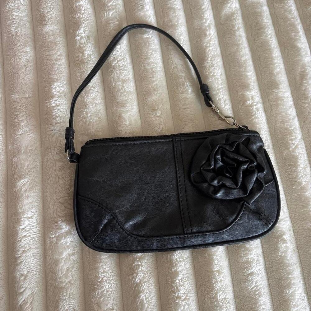 Black leather bag with rose